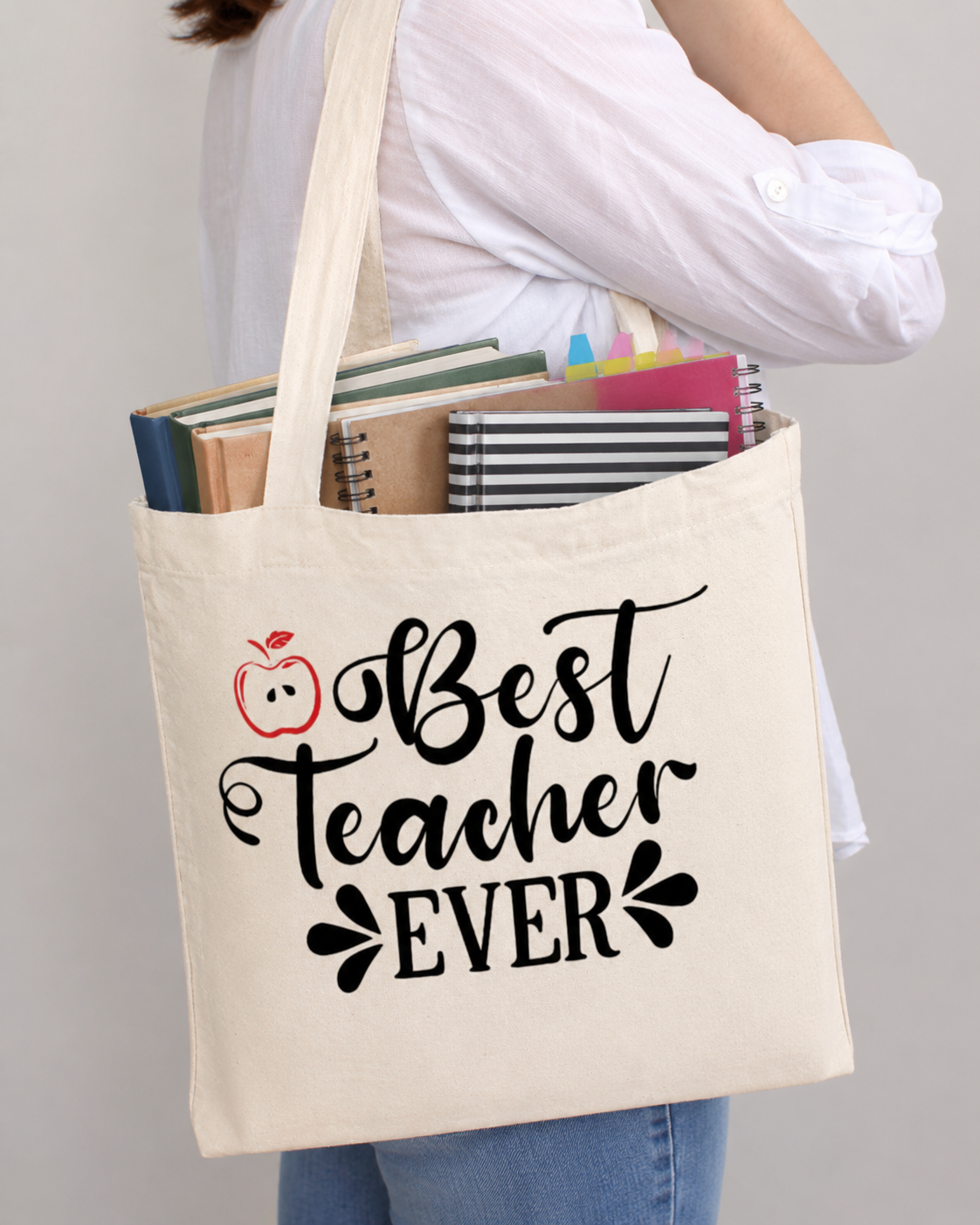 Teacher cotton tote bag with books and notebooks inside