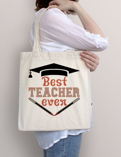 Woman carrying Best Teacher Ever cotton tote bag