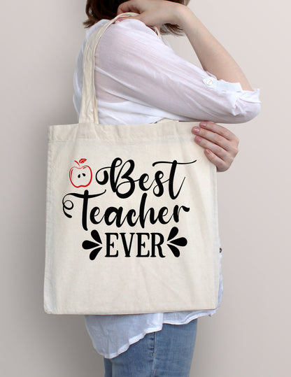 Woman carrying Best Teacher Ever cotton tote bag