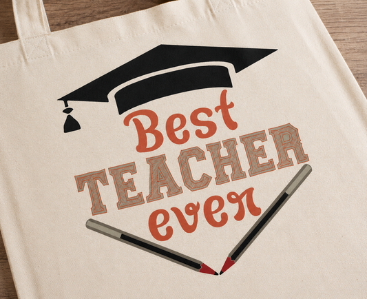Close-up of Best Teacher Ever graduation print on cotton tote bag