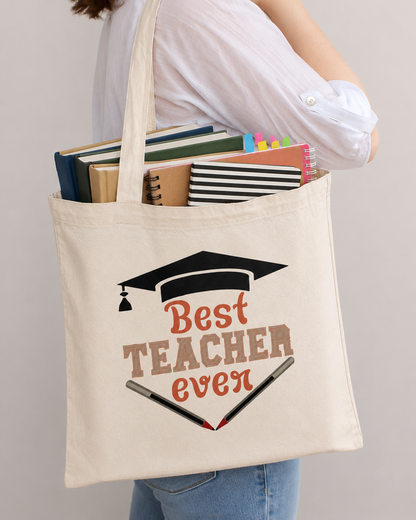Best Teacher Ever cotton tote bag filled with books and notebooks