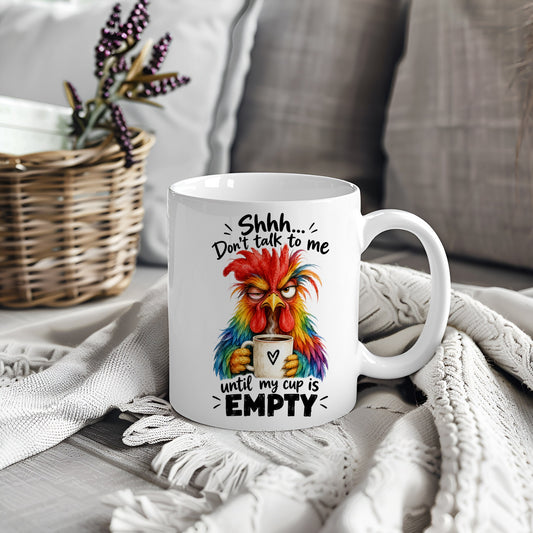 White mug with rooster holding coffee and text Shhh Don't Talk To Me Until My Cup Is Empty