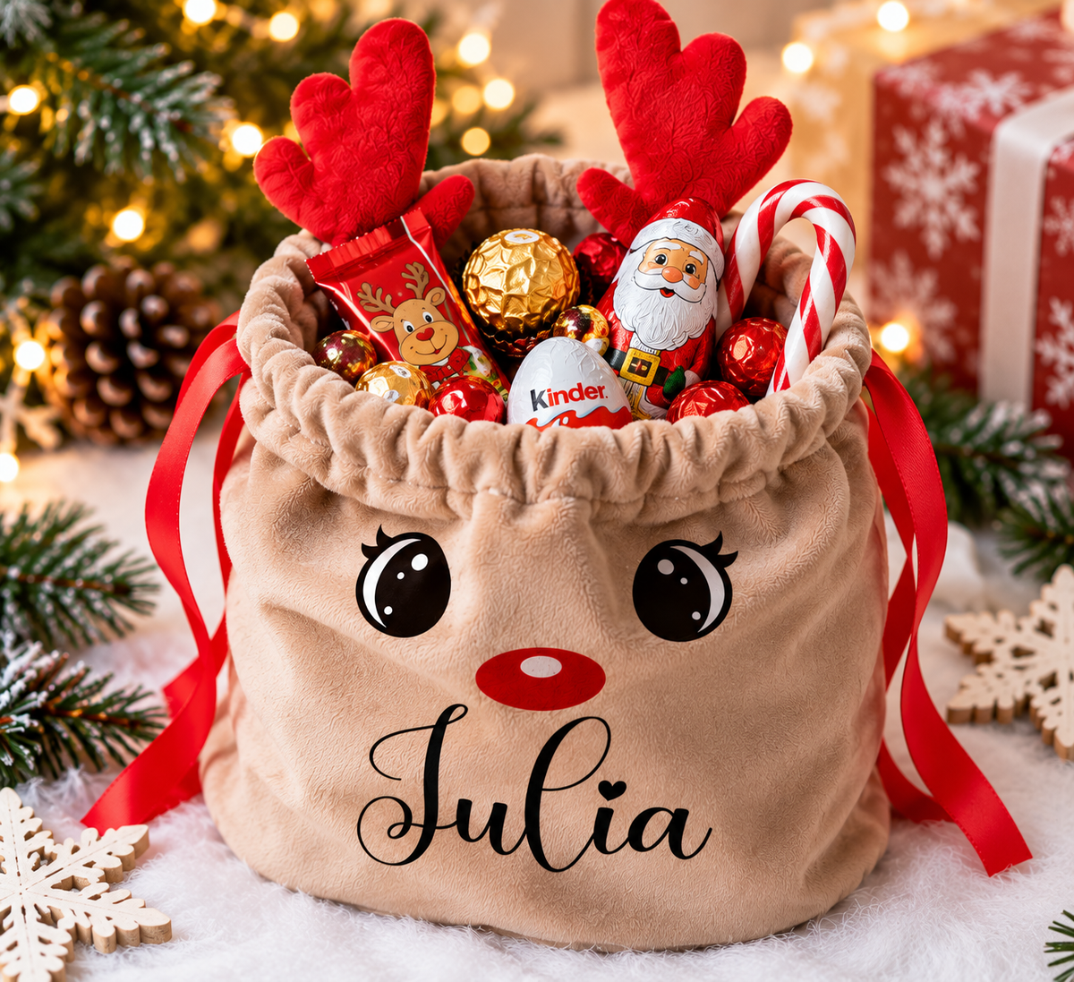 Personalised Julia reindeer Christmas gift bag filled with chocolates, festive sweets and candy cane