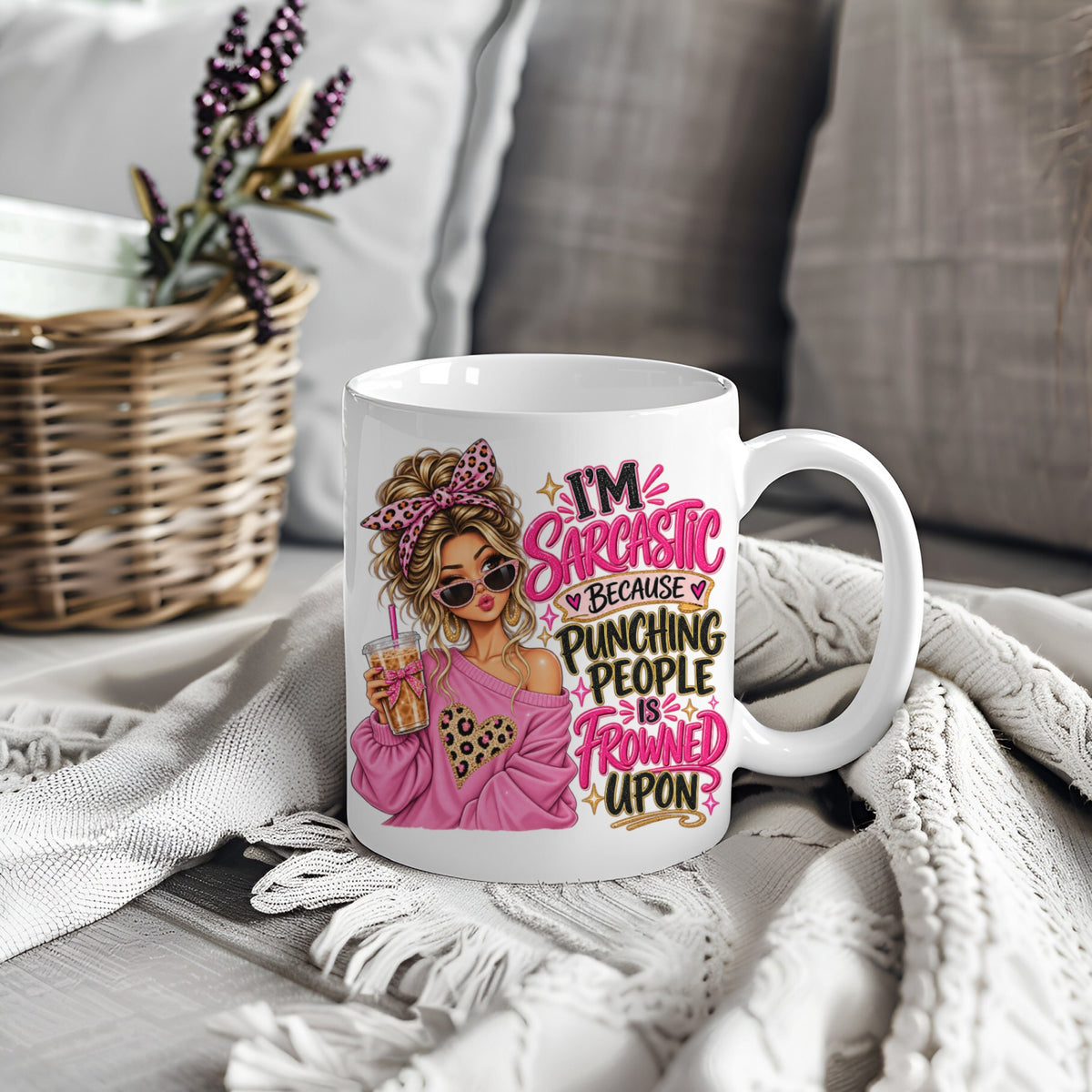 White mug with pink woman design and sarcastic quote about punching people