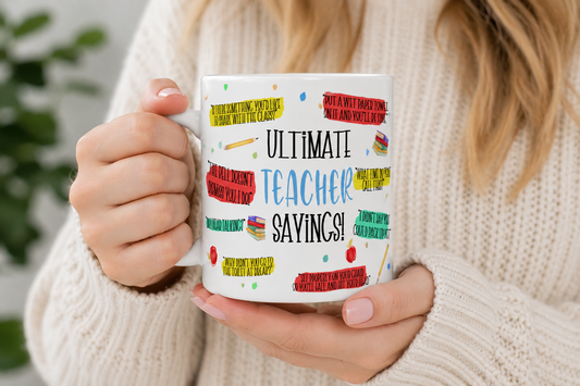 Funny Ultimate Teacher Sayings 11oz ceramic mug held in hands
